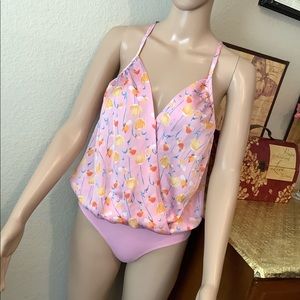 Pink silky body suit has that tucked in look E126